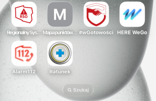 Zrzut ekranu telefonu pokazujący ikony sześciu aplikacji dotyczących bezpieczeństwa: RSO (czerwony zarys granic Polski), Mapa punktów... (biała litera M na szarym tle), #wGotowości (czerwona tarcza i dłonie), HERE WeGo (niebieskie logo), Alarm112 (czerwony aparat telefoniczny) oraz Ratunek (niebieski krzyż na żółtym tle)